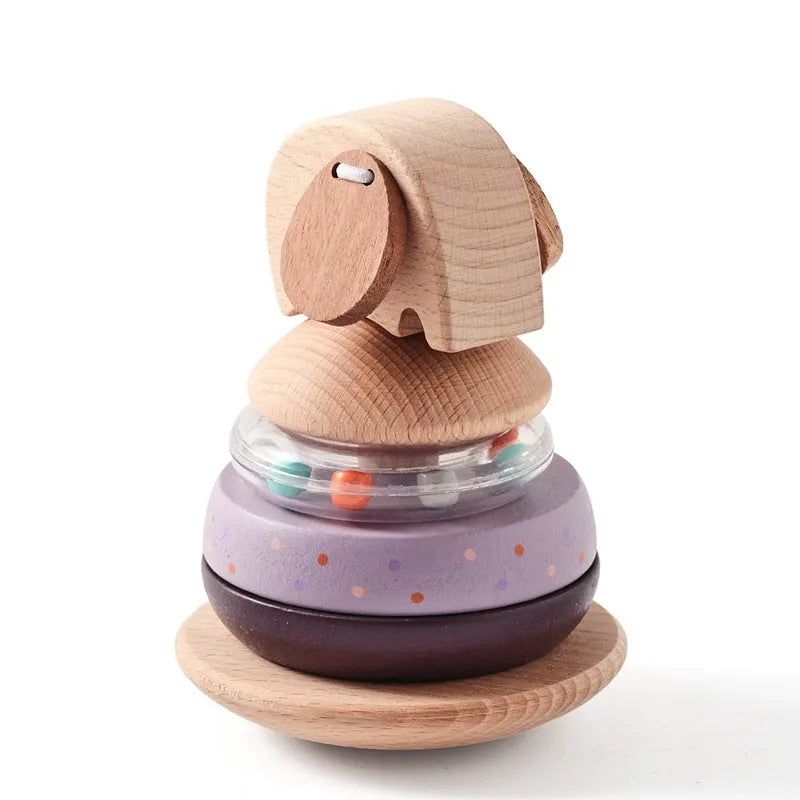 Wooden baby stacking post set with colourful shapes on a central post, packed in a cowhide box