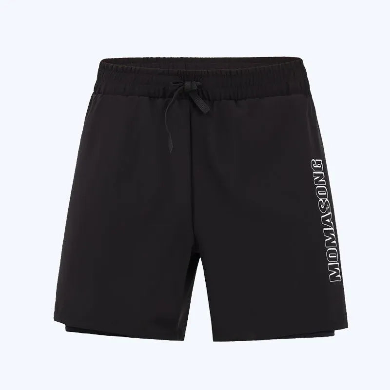 Men's white long-sleeved swim top with matching blue double-layer swim trunks on a beach.