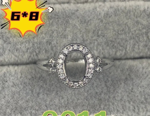 Oval denier open mouth ring with 6x8mm stone and five-pointed star on copper band.