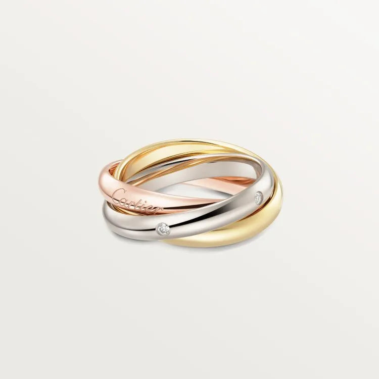 A silver couple ring with a full diamond band on a finger, showing geometric shape and personalised text engraving.