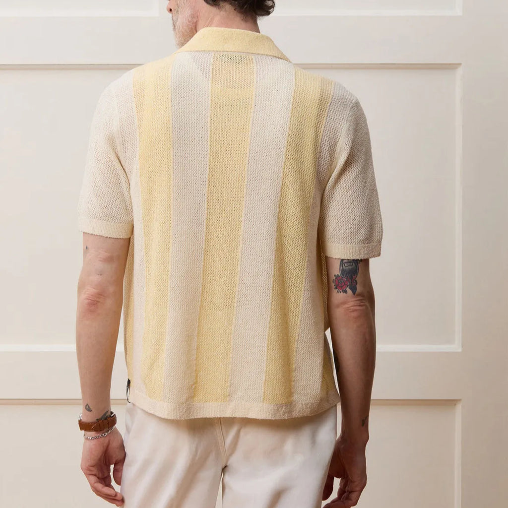 Yellow casual polo shirt with asymmetric hollow-out design and short sleeves