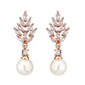 Geometric earrings with micro zircon stones and flower design in gold, platinum or rose gold plating