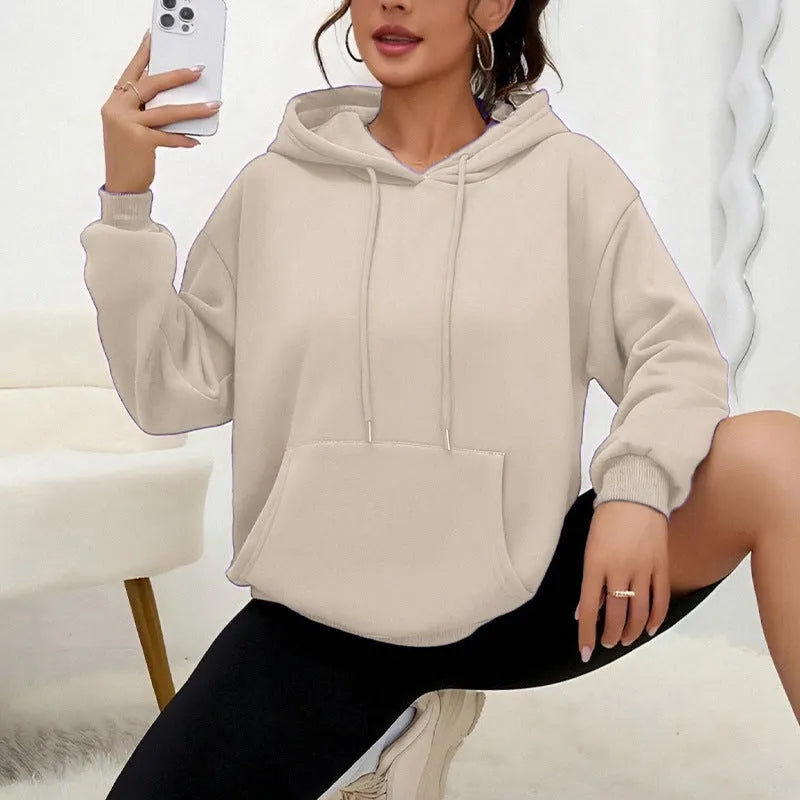 Women's loose drawstring pocket sweatshirt in various colours showing front pockets and adjustable collar