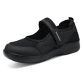 Women's low-top casual shoe in grey mesh with Velcro strap and flat polyurethane sole.