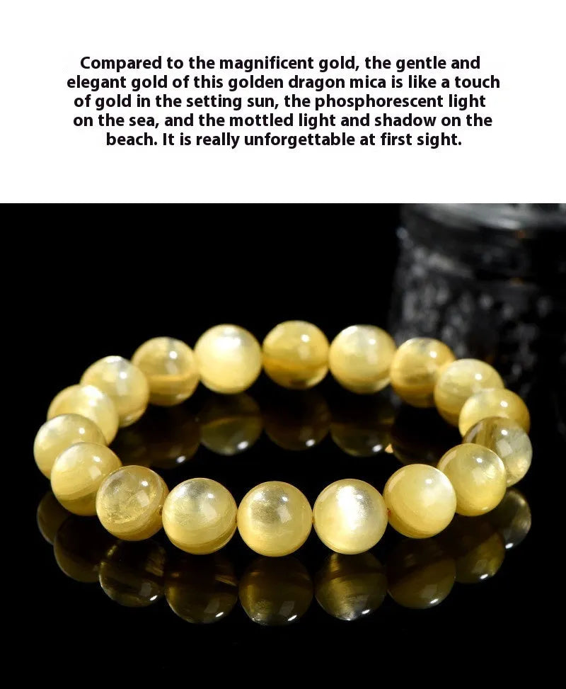 Yellow dragon gold lepidolite mica bead bracelet with geometric round beads on wrist