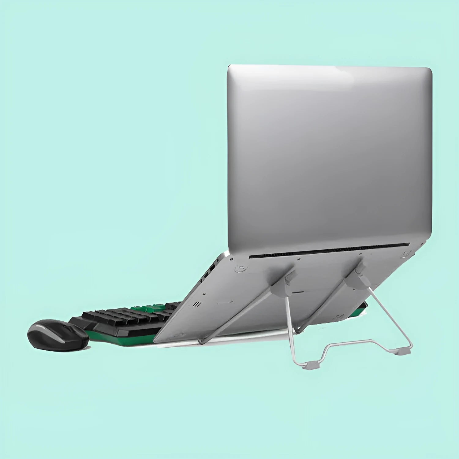 Grey aluminium alloy and plastic mobile phone and laptop stand on a wooden desk.