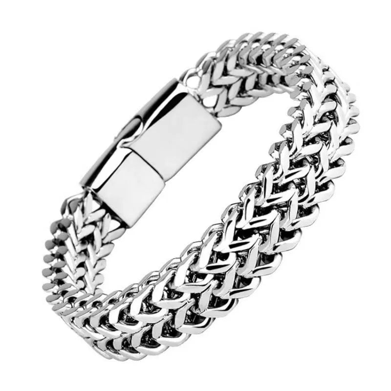 Men's geometric stainless steel bracelet showing front and back patterning with silver finish