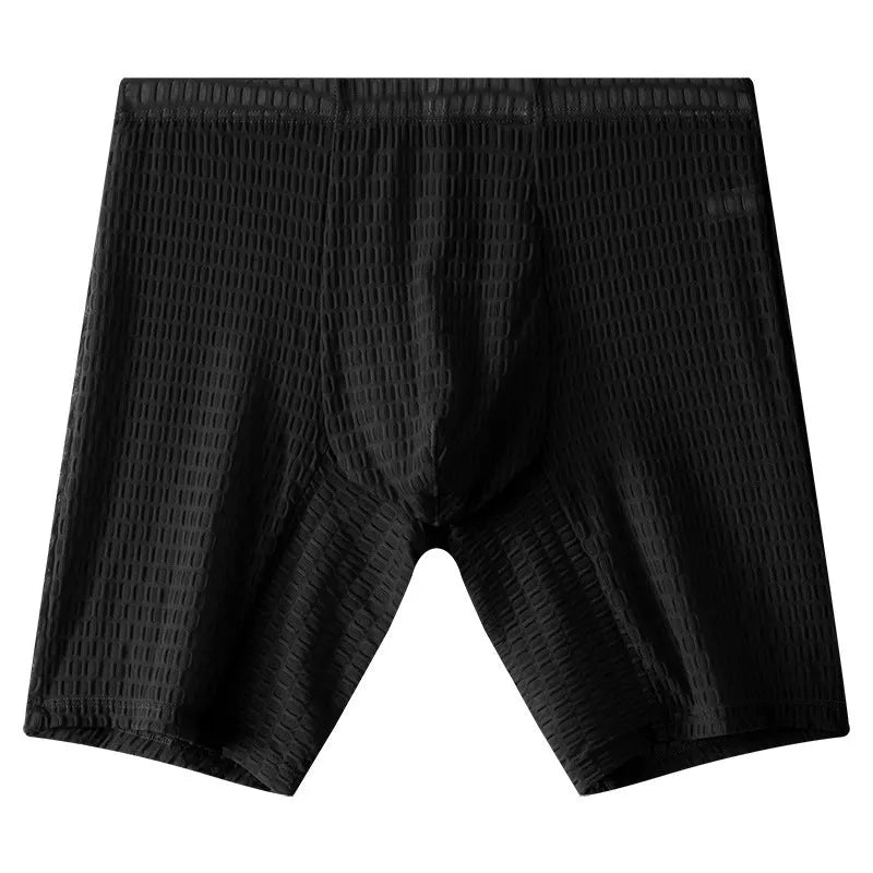 Men's lengthened transparent lace boxer shorts on a neutral background, showing mid waist and leg detail.