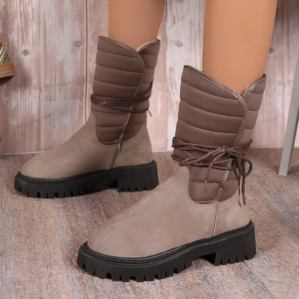 Women's black chunky heel snow boots with lace-up front and fleece lining