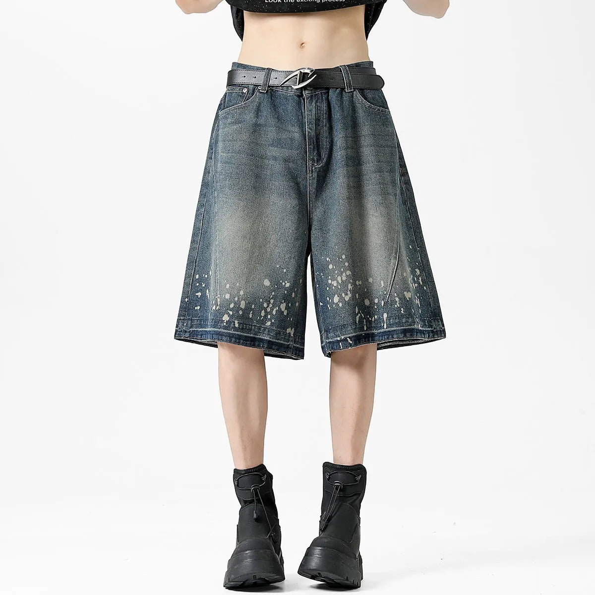 Men's retro blue denim shorts with splash ink distressing and straight-leg cut