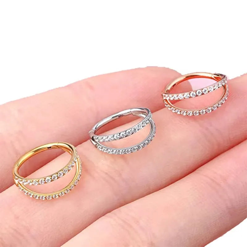 G23 titanium alloy lip ring nose ring with diamond treatment in steel or gold colour, showing puncture ring design