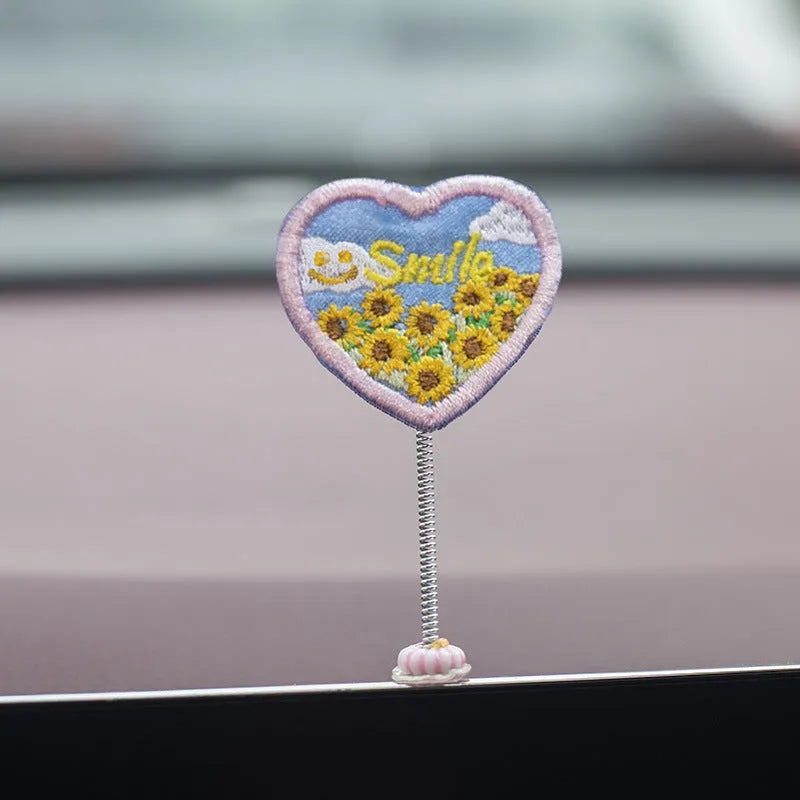 Set of six small PVC duckling ornaments and one larger Hello welcome sign for car interior decoration.