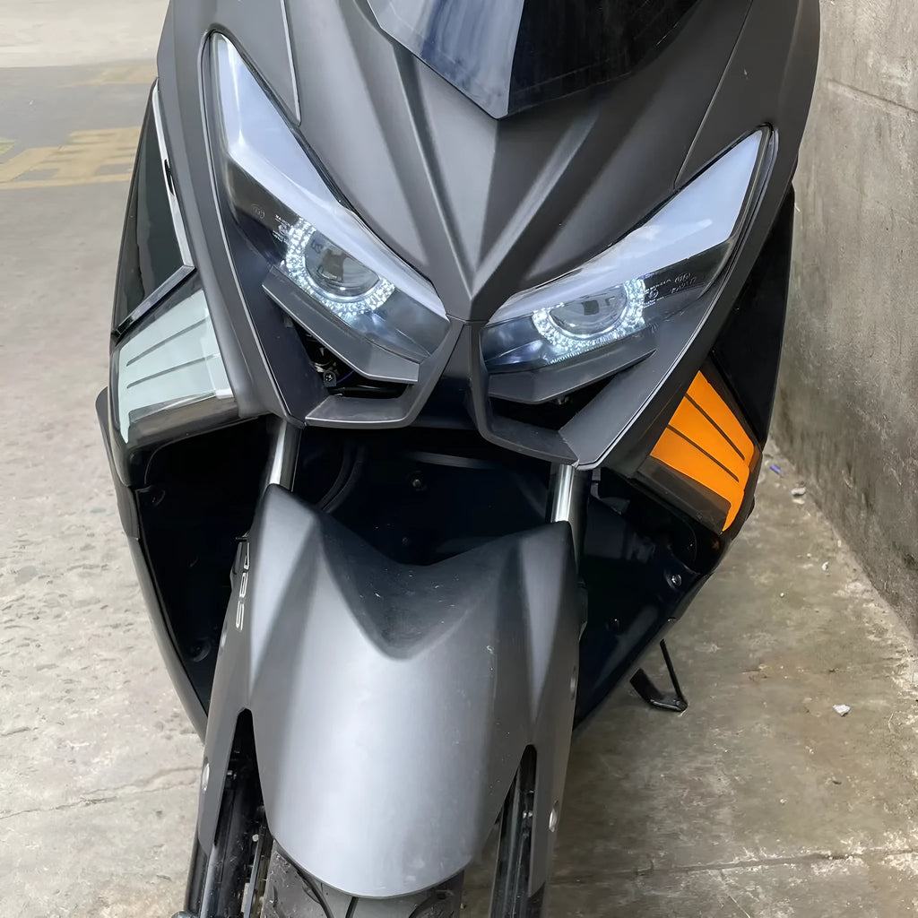 Two yellow LED cornering lamp bulbs for Tianying TS150 motorcycle retrofit.