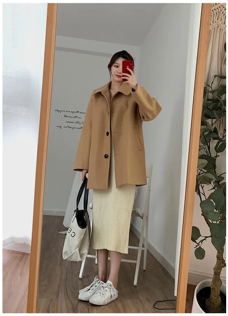 Women's Korean-style loose mid-length solid colour overcoat in black with long sleeves