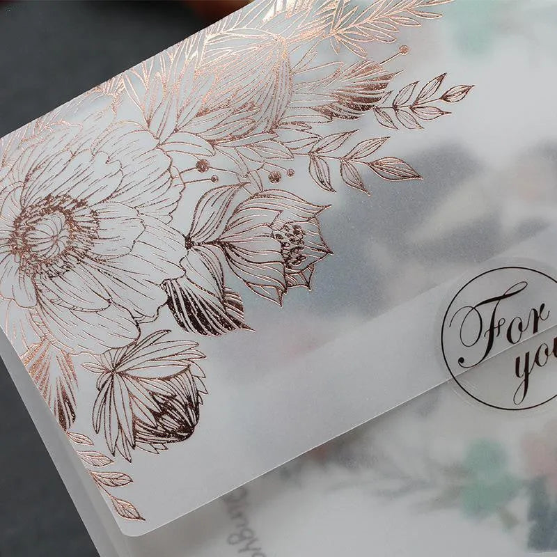 Gold bronzed sulfuric acid paper invitation card with matte finish measuring 12.5 by 17.6 centimetres