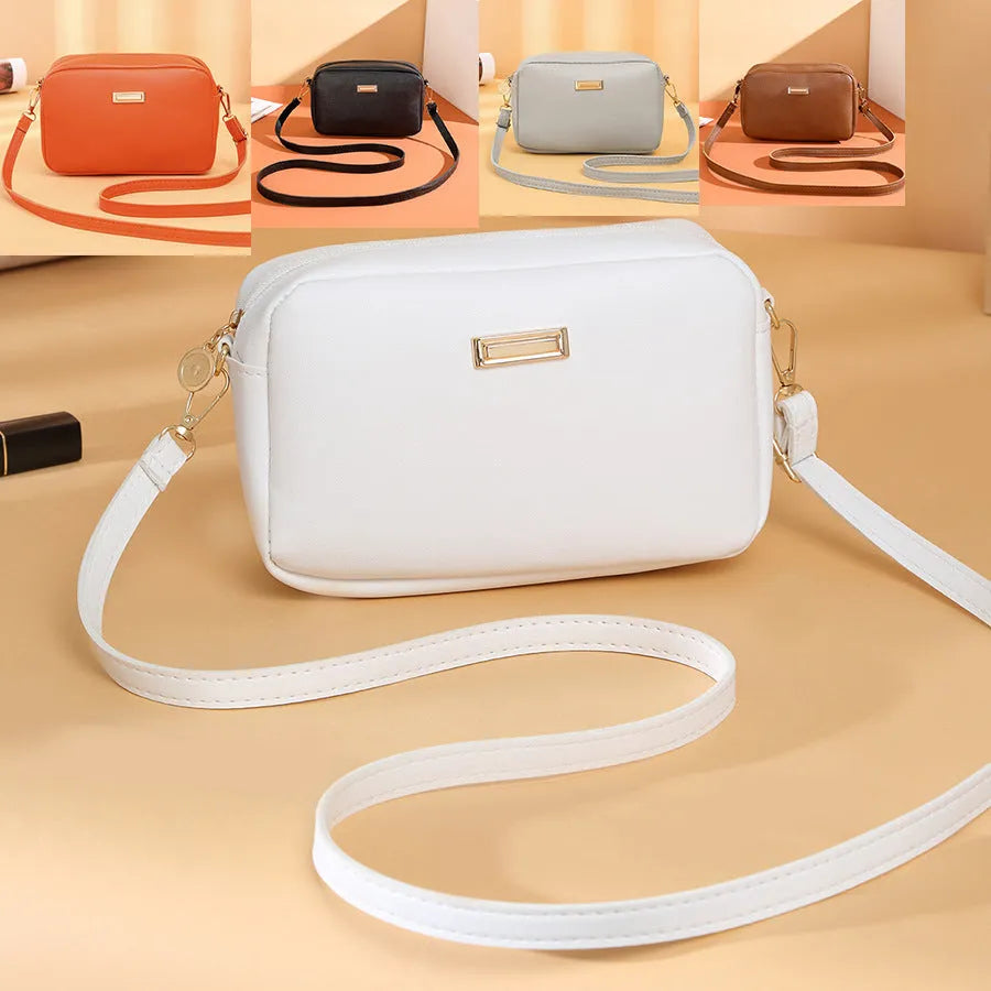 Women's solid colour PU shoulder bag with a three-dimensional pocket and horizontal square shape.