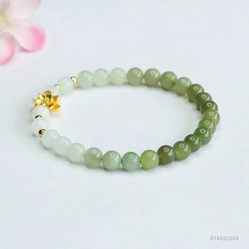 Hand-woven Chinese jade bracelet with 6mm lotus beads in water gradient pattern