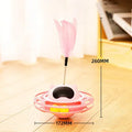 Pink cat tumbler turntable toy with automatic motion mechanism for indoor feline play