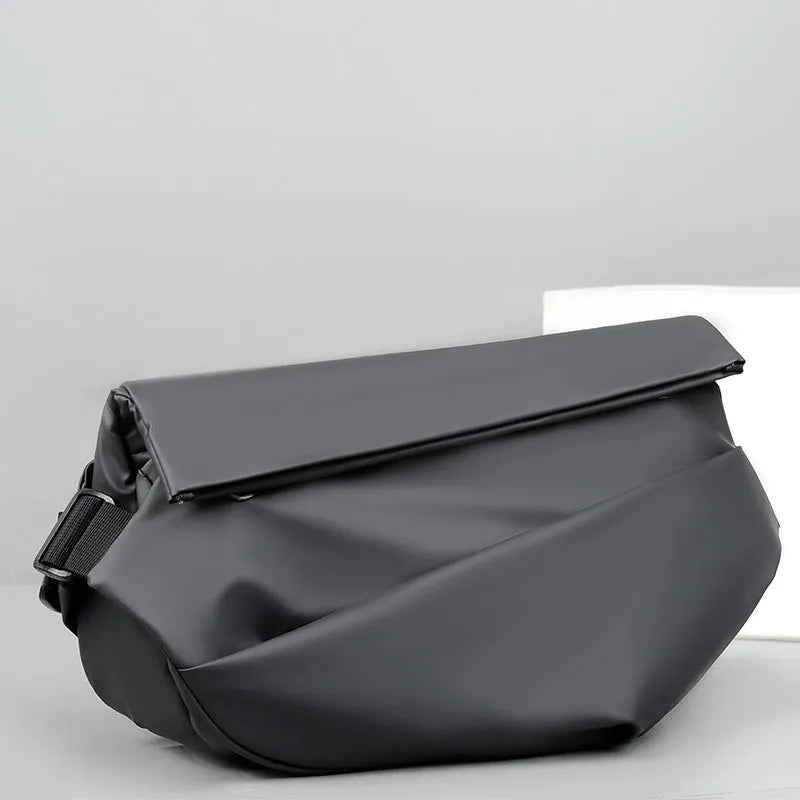 Grey PU leather men's crossbody bag with a shoulder strap, shown with open compartment for phone and documents.