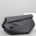 Grey PU leather men's crossbody bag with a shoulder strap, shown with open compartment for phone and documents.
