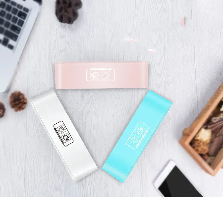 Rectangular digital alarm clock with LED atmospheric lighting and music function in blue colour option