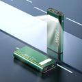 Black alloy power bank with LCD screen showing battery level, alongside green, red, and blue colour options.