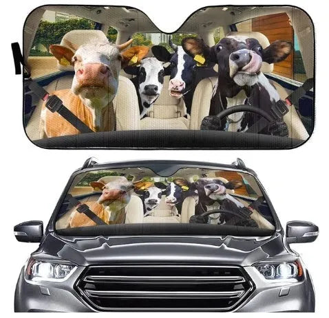Telescopic aluminium foil car sun visor extended across a vehicle windshield