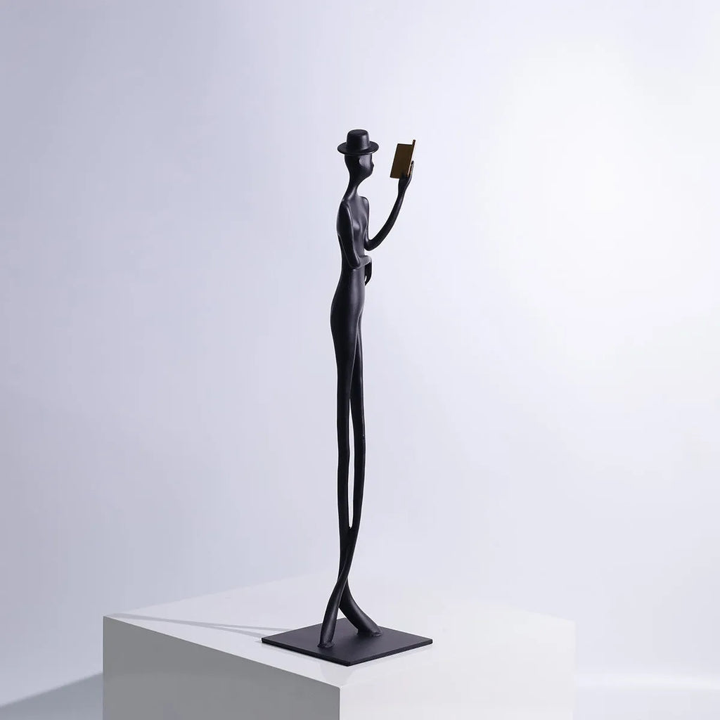 Black cast aluminium reading woman desktop sculpture modern design 51cm tall