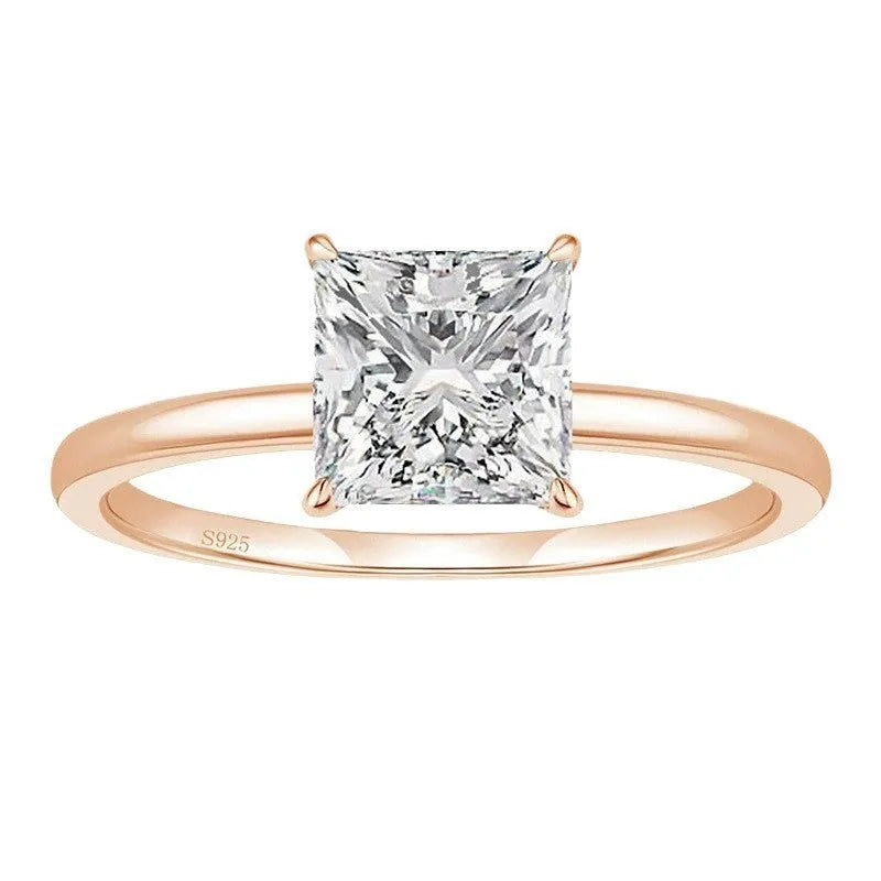 Simple geometric 925 silver ring for women in polished gold, rose gold, or silver finish on a grey background.