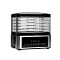 Silver stainless steel food dehydrator appliance with digital control panel on a kitchen counter.