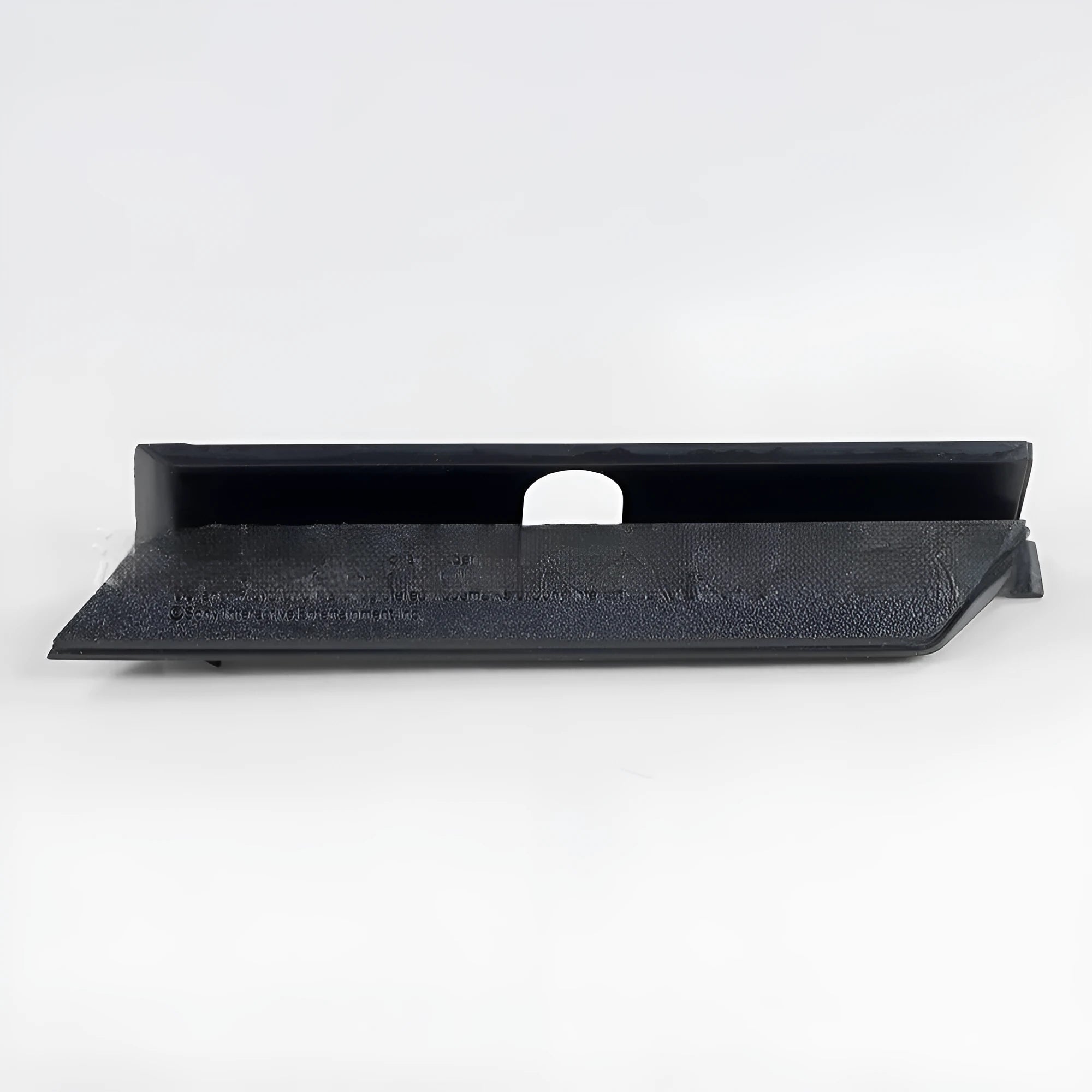 Black and white plastic hard disk baffle bin cover for internal drives.