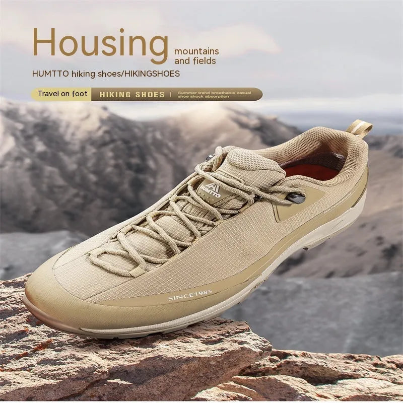 Men's low-top mountain climbing shoes with leather mesh upper and non-slip rubber outsole in black colour