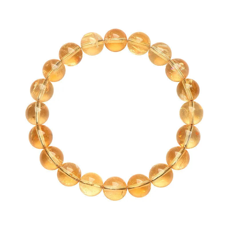 Natural yellow citrine gemstone bracelet showing geometric beads on a string.
