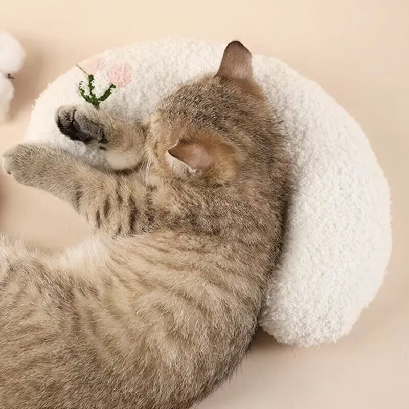 Blue U-shaped pet pillow for cat neck support with moon design on cloth material