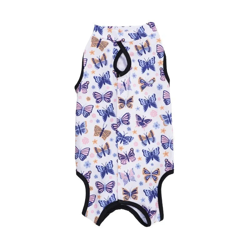 Cat wearing a patterned polyester recovery suit with Velcro fastenings after sterilisation surgery.