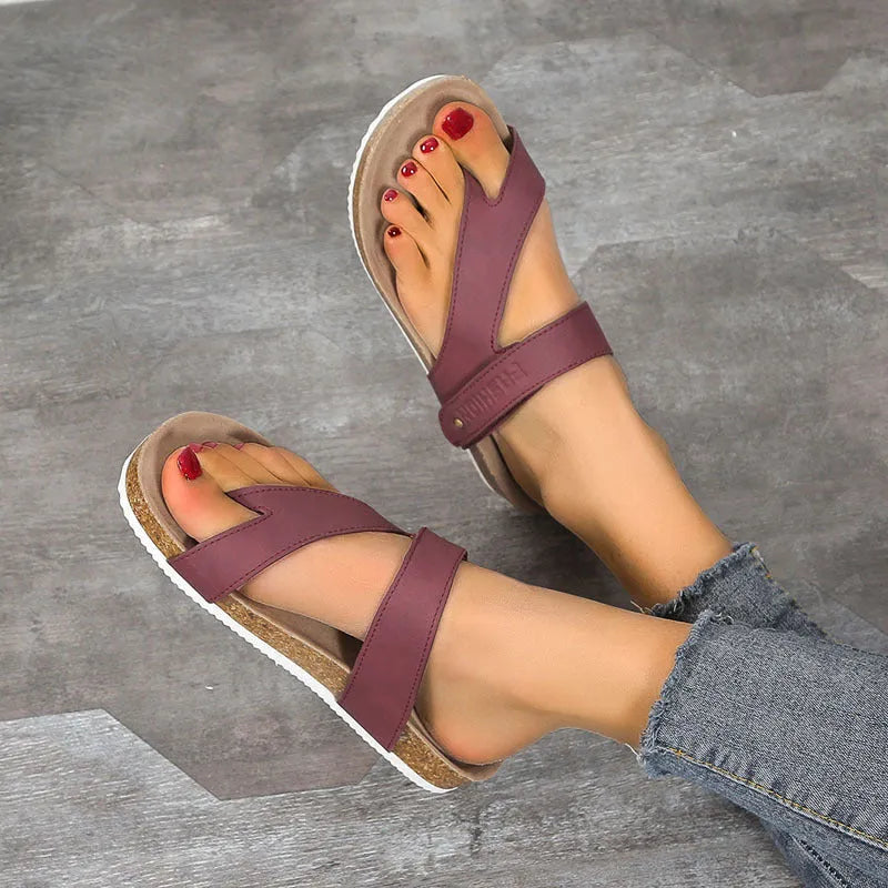 Flat toe ring flip-flops with a thick foam sole in a solid colour, shown in blue.