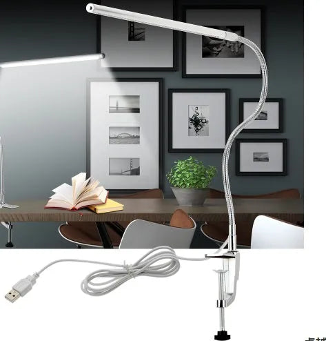 Silver aluminium alloy LED clip-on table lamp with long adjustable arm for nail art lighting.