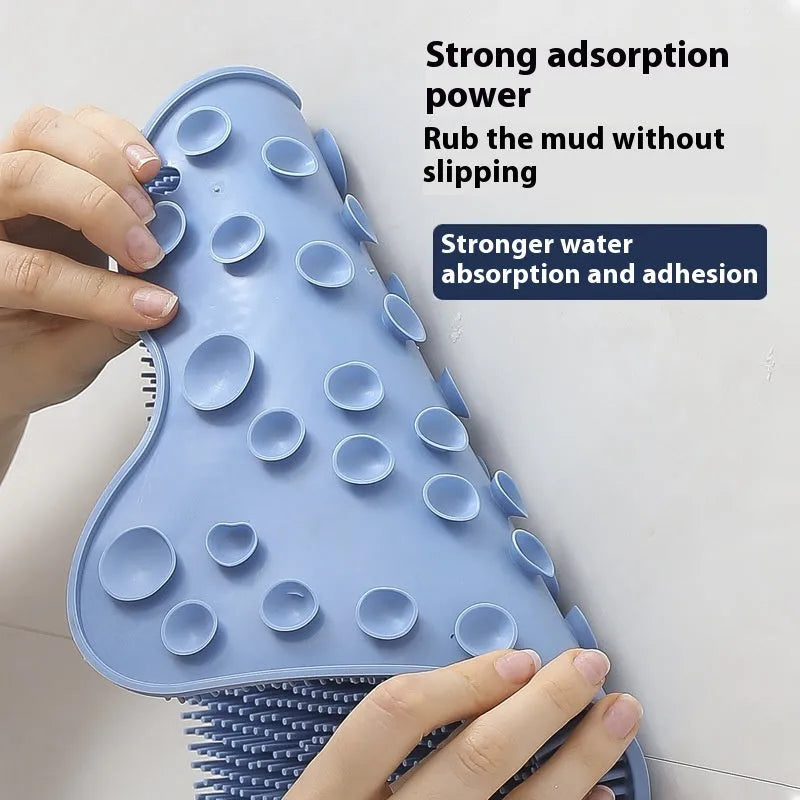 Blue silicone bath massage cushion mat for handheld back scrubbing, measuring 31cm by 32cm.
