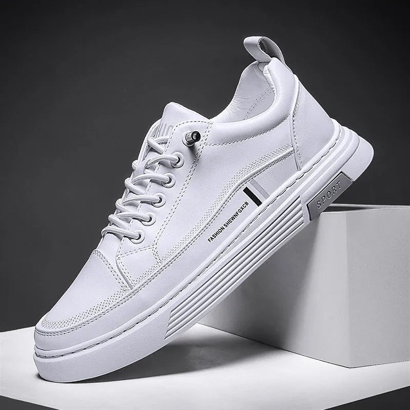 Men's white low-top skate shoes with elastic band and round toe, on a plain background.