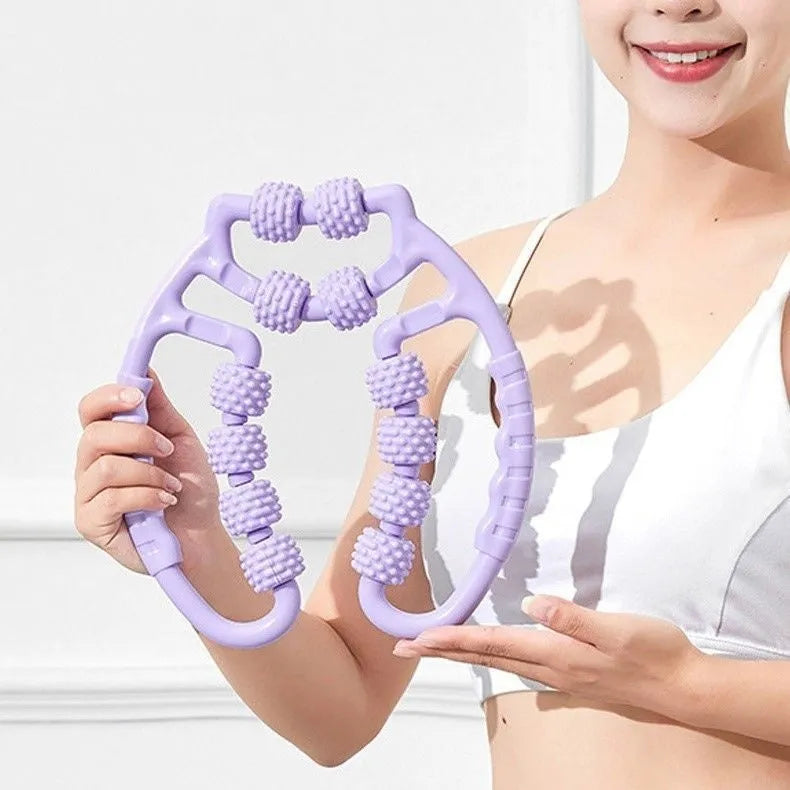 Close-up of a manual leg massager roller with a ring-clip handle and multiple plastic wheels.