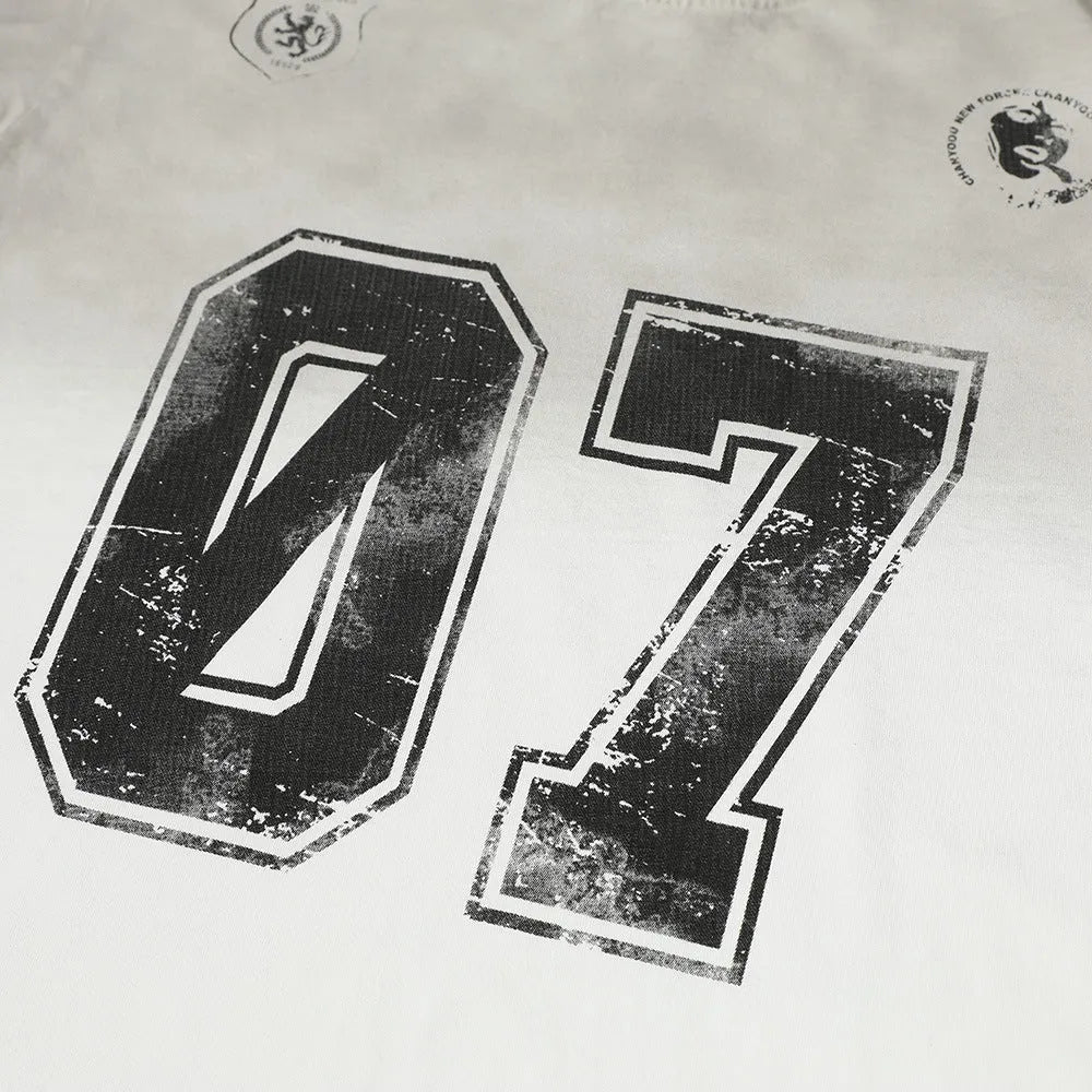 Man wearing a black printed short-sleeved cotton t-shirt showing the front design.
