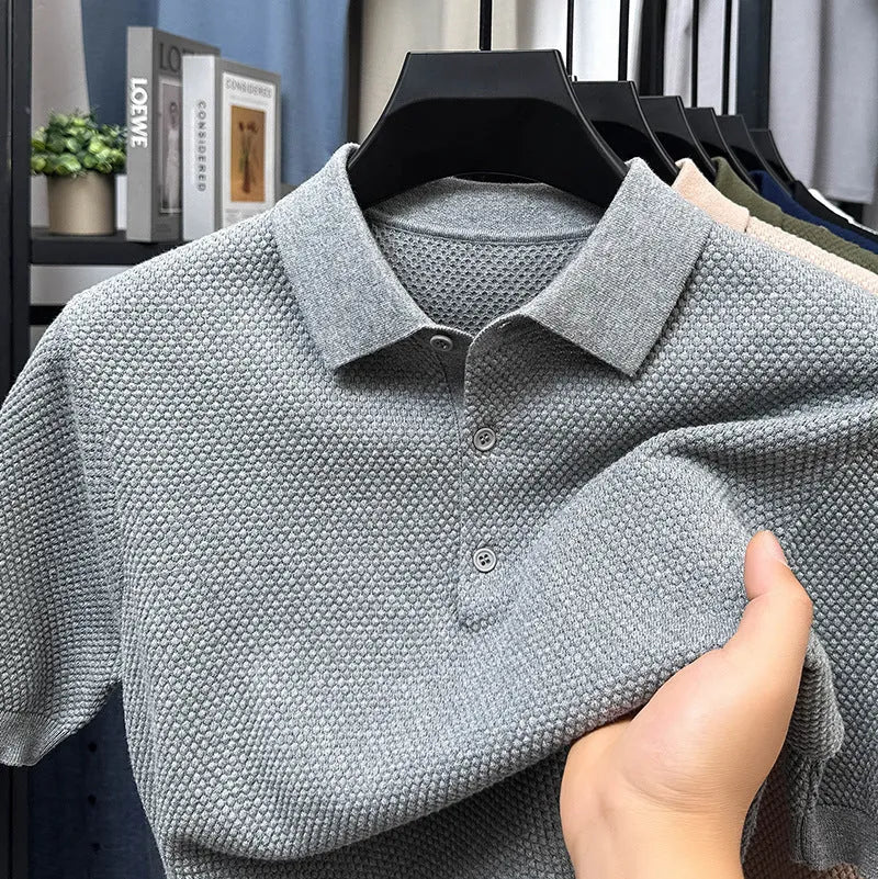 Loose fit pure cotton short sleeve pullover sweater shown in various colours including grey and navy.
