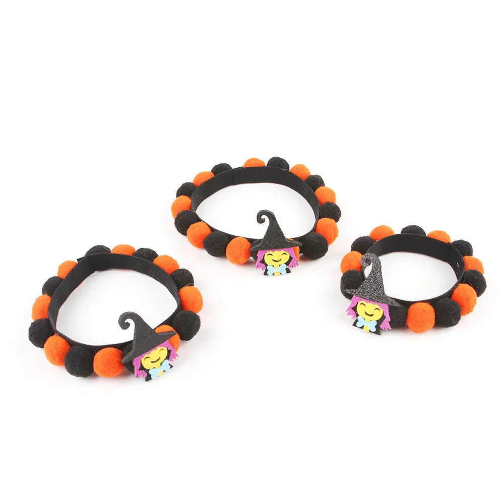 Halloween pet fur ball collar in six designs including pumpkin, skull, and witch themes
