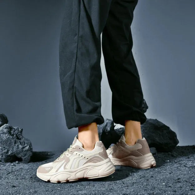 Men's beige and black collapse flat casual sneakers shown in a folded and unfolded state.