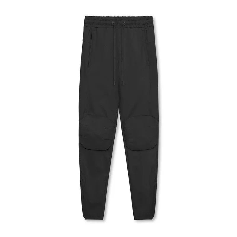 Men's grey ankle-tied running trousers for fitness exercise with quick-dry polyester fabric