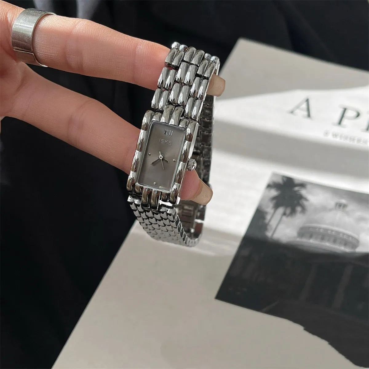 Women's Ins bracelet watch with 15mm dial, butterfly buckle, and silver or gold strap options.