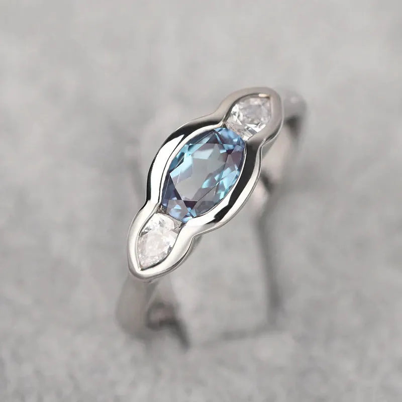 Women's geometric ellipse fashion ring with zircon stones and white gold plating