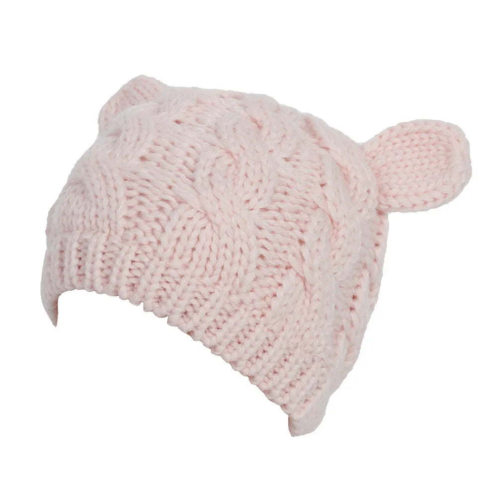 Hand made knitted cat ear beanie in winter colours with 3D design