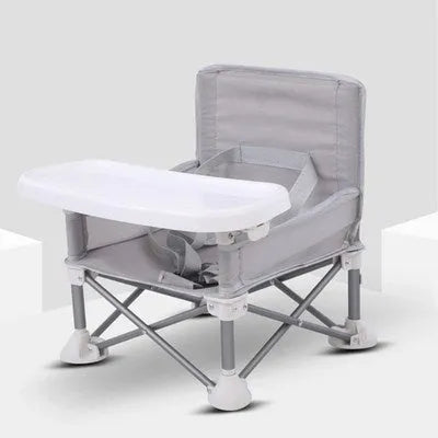 Foldable baby dining chair with metal frame, removable tray, and safety belt in grey