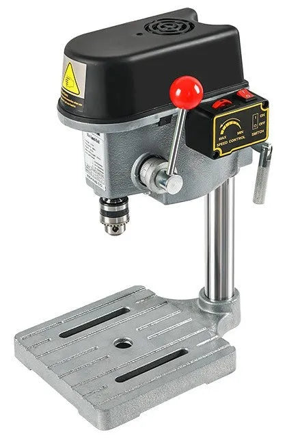 Mini bench drill and milling machine on a workbench with cross bench pliers and heavy-duty pliers.